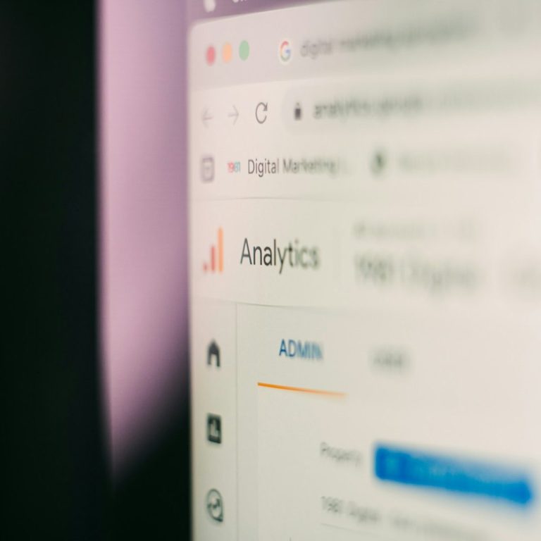 Close-up of a computer screen displaying an analytics dashboard.